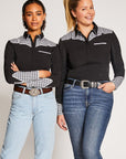 Two women both wearing the Holt Western Shirt with black and white check pattern at shoulder and on the sleeves.